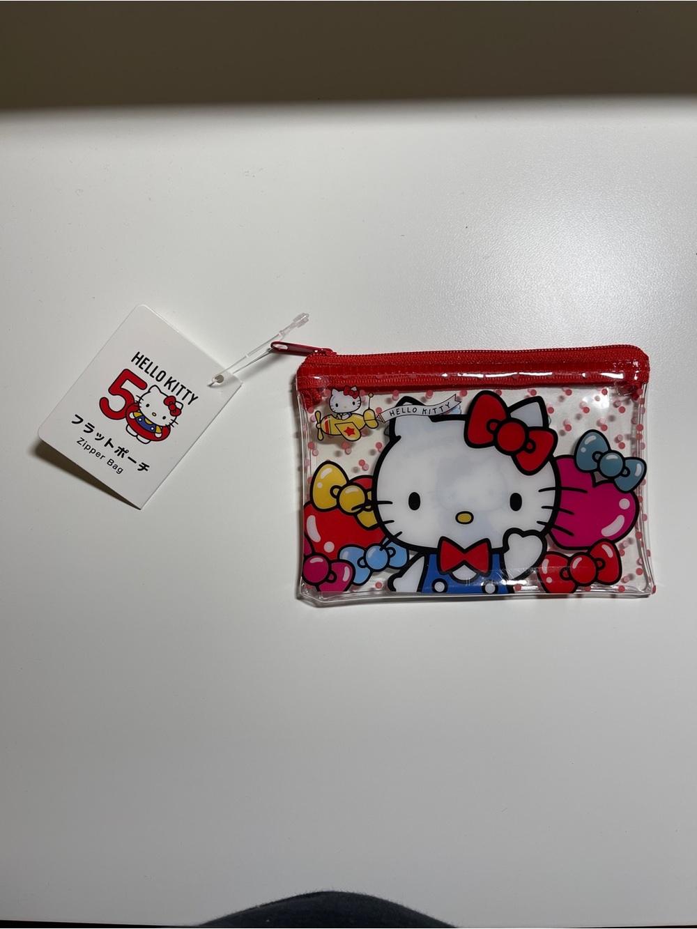 Sanrio HELLO KITTY 50 Anniversary clear plastic ZIP COIN POUCH